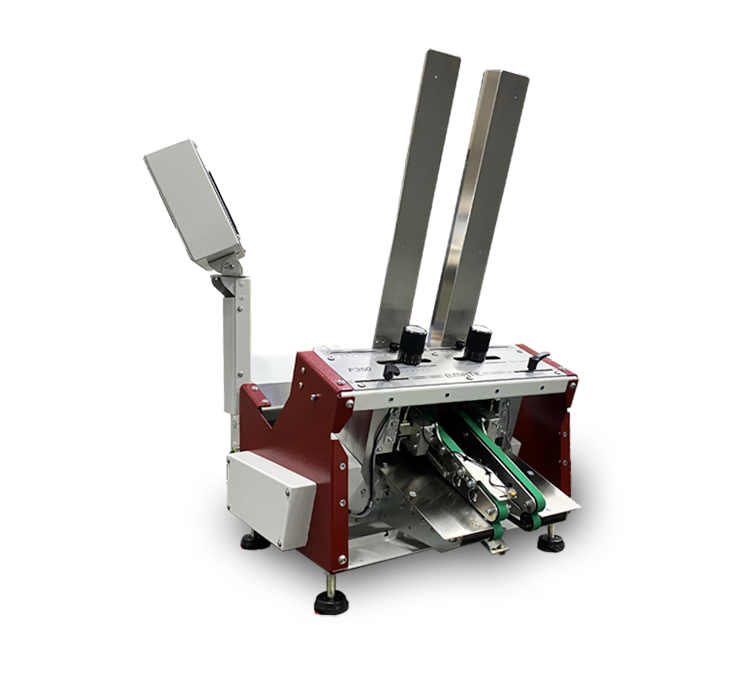 A mechanical device with two vertical metal arms and a control panel, used for automated processing.